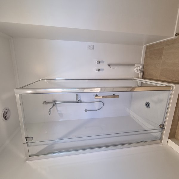 Walk-in glass shower enclosure installed by Plumberz in West Auckland